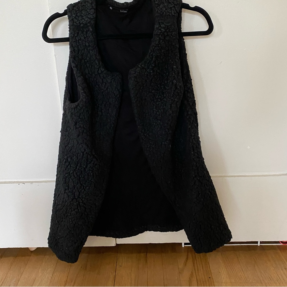 Black leather covered vest